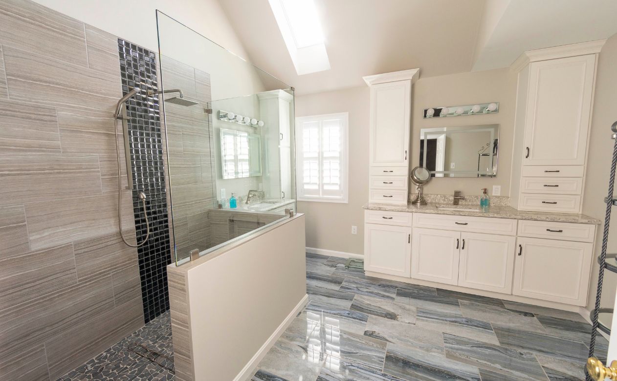 bath remodel with waterproof flooring , custom tile shower, vanity in Lititz, PA by Cloister's Flooring America