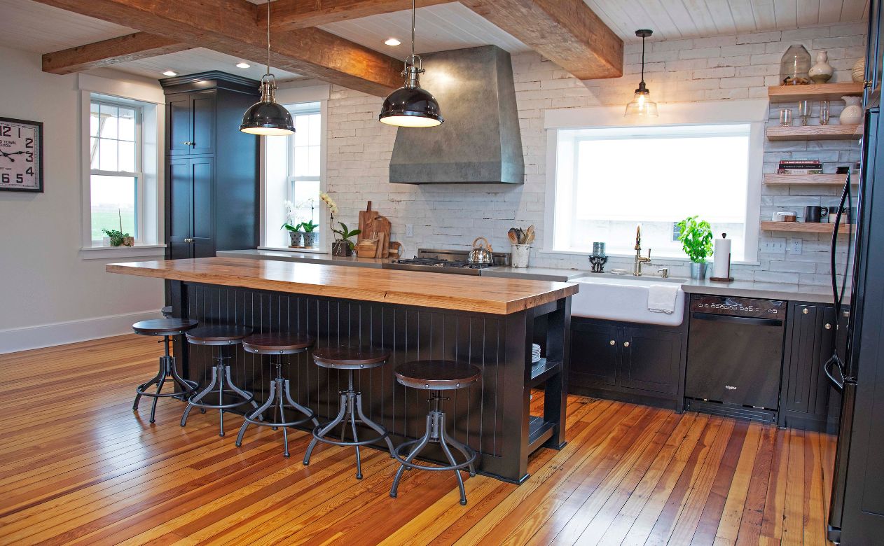 rustic kitchen remodel in Ephrata, PA, with butcher's block island, hardwood floors, and white brick backsplash