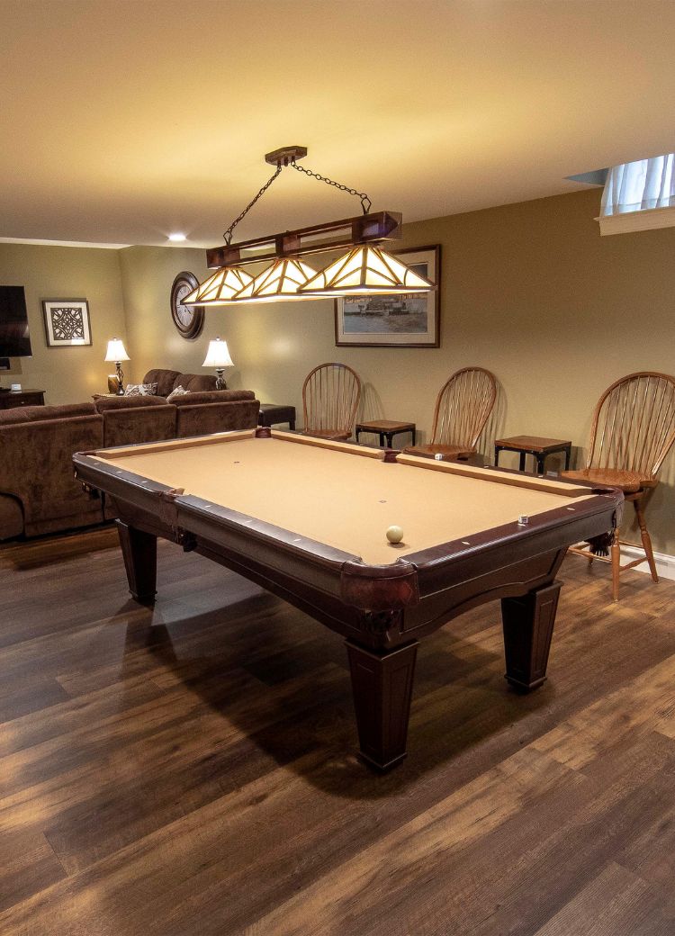 finished basement with pool table in a PA basement with vinyl wood look floors