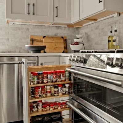 Cabinet installation with white cabinets and spice drawer in PA